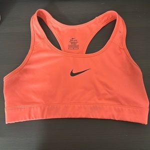 NIKE Dri-Fit non-padded sports bra coral with black nike logo